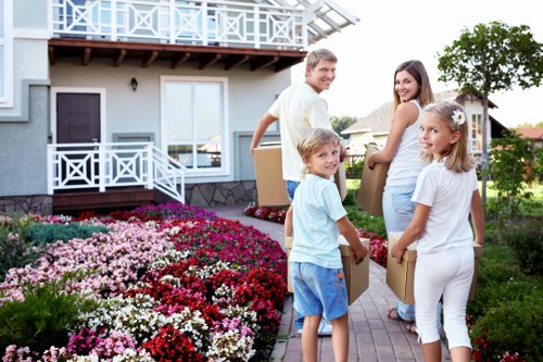 Volunteers inspecting furniture for reuse before donation